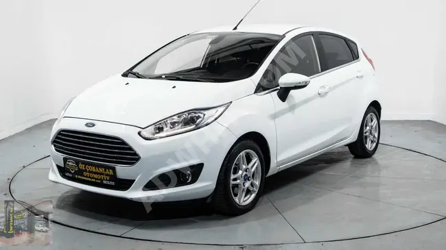 The Ford Fiesta car, serviced at the dealership, model 2015, is eligible for a loan.