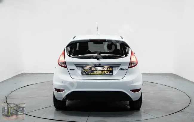 The Ford Fiesta car, serviced at the dealership, model 2015, is eligible for a loan.