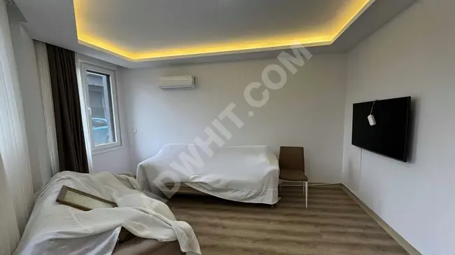 A new 2+1 apartment in a modern building near MARMARA