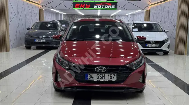 2023 Hyundai i20 model with no accidents and no modifications, maintained in service. Red color with a loan interest rate of 1.99%.