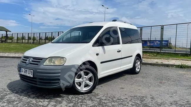 Volkswagen Caddy 1.9 TDI model 2005 at an affordable price. Well-maintained Combi Caddy 1.9 equipped with windows and seats.