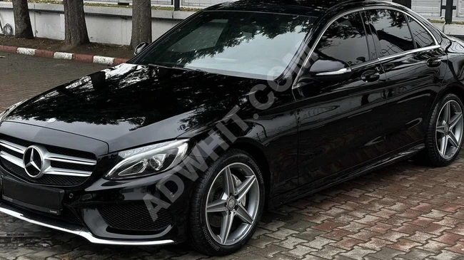 موديل 2014 MERCEDES C 180 AMG -سقف زجاجي-زينون-تدفئة-فئة أولى