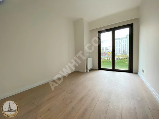 New 2+1 apartment with a private garden in Emlak Konut Bizim, Section 3