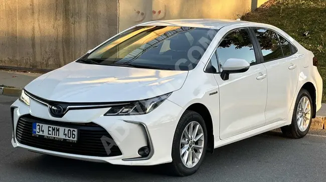 سيارة Corolla 1.8 Hybrid موديل 2021  متابعة المسار المروري، مانع الاصطدام - 1.99 قرض  كيلومترات منخفضة