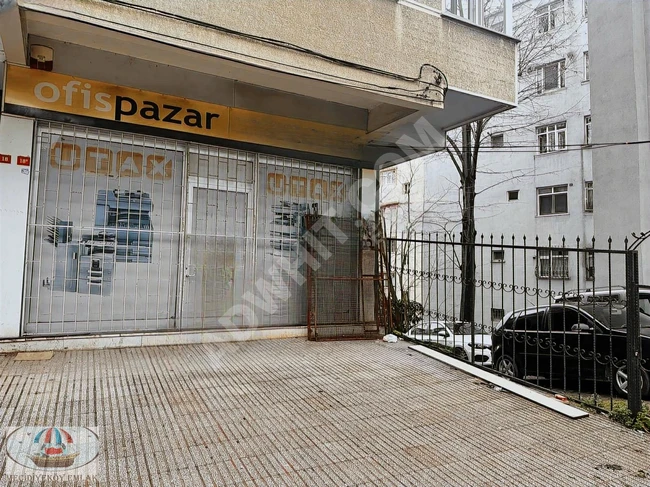 A vacant two-story shop in the center with two separate entrances.