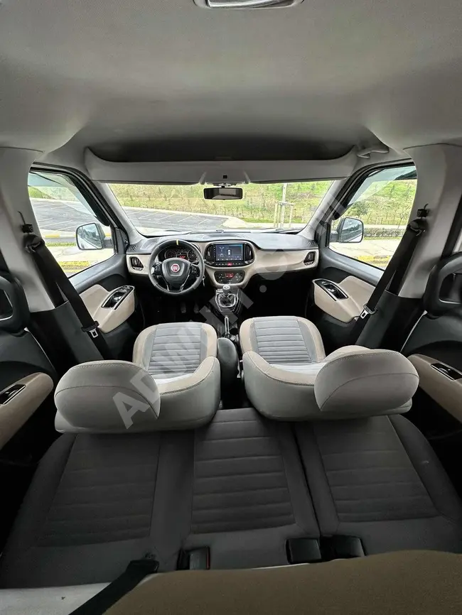 Fiat Doblo 2017 model, with a mileage of 145,000 km, no errors, 6 speeds, eye lamps, electric mirror.