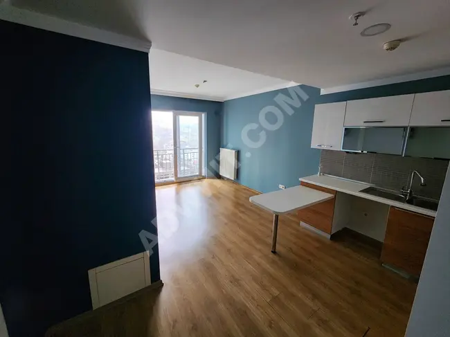 The most beautiful 1+1 apartment in the complex, painted, clean, and spacious, available for rent with an area of 51 square meters.