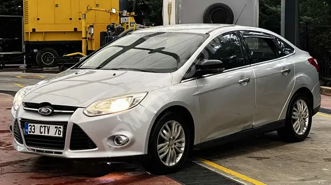 سيارة Ford Focus موديل 2013 بمسافة قليلة وجمال لا يوجد شائبة.