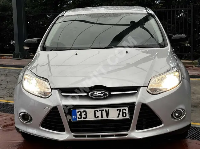 سيارة Ford Focus موديل 2013 بمسافة قليلة وجمال لا يوجد شائبة.