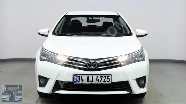 Toyota Corolla  موديل 2014 -  إمكانية التقسيط 6/12 شهر  بدون شروط ولا كفيل تسليم فوري