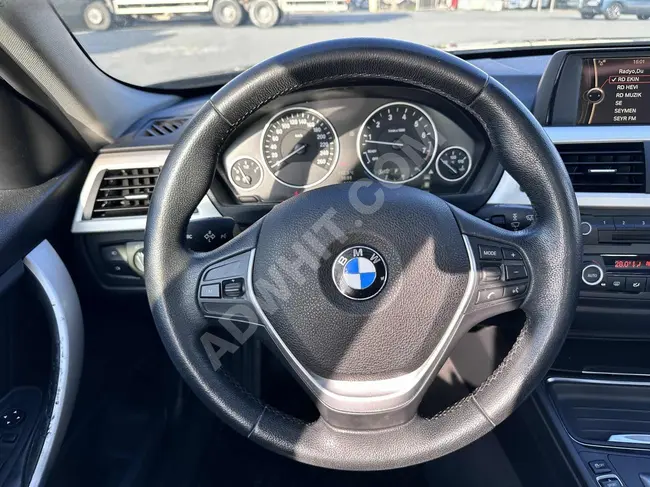 BMW 3.20i - موديل 2013 - خاليه من العيوب والطلاء - عدد كيلومترات منخفض - من ARAS