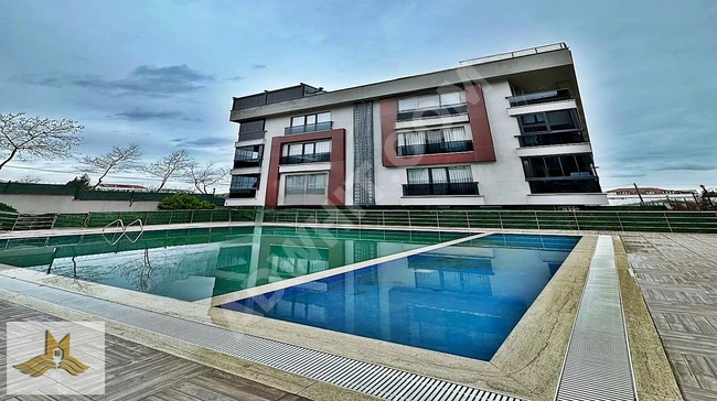 2+1 apartment in a residential complex with architectural design and winter garden in BEYLİKDÜZÜ