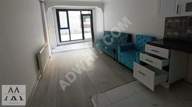 Apartment for rent in a new building with garden use near MARMARAY station in YENİ MAHALLE