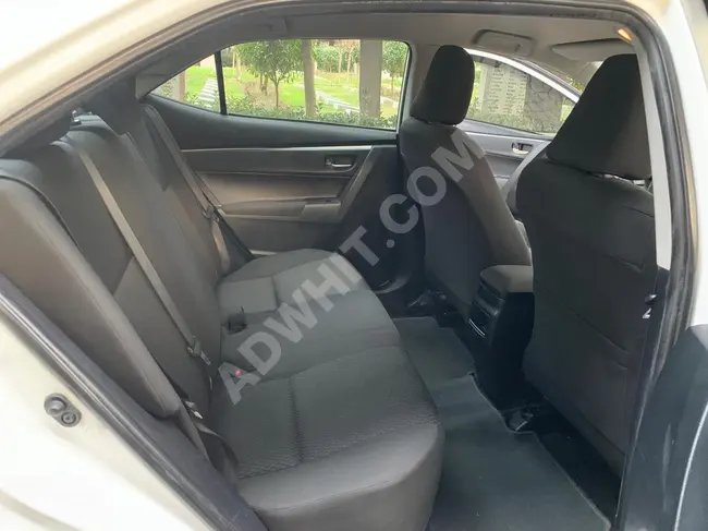 A very clean COROLLA car with a tablet screen, runs for 125,000 km