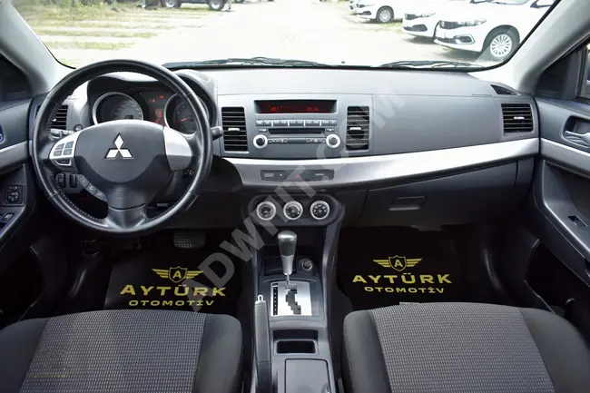 Mitsubishi Lancer car, 2009 model, with 49,000 km - fully automatic.