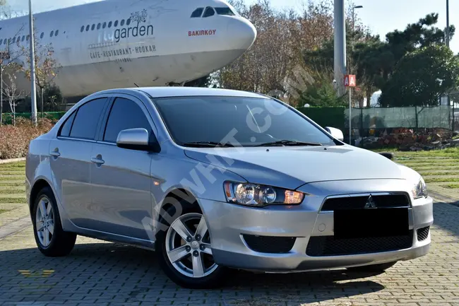 Mitsubishi Lancer car, 2009 model, with 49,000 km - fully automatic.