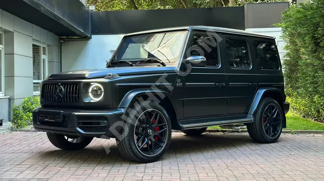 سيارة MERCEDES G63 AMG موديل 2023 - من وكيل لون أسود مات عجلة قيادة رياضية