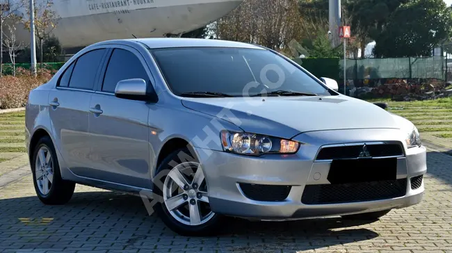 MITSUBISHI LANCER model 2009 1.5 INVITE automatic with 49,000 km mileage, the only one in Turkey