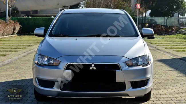 Mitsubishi Lancer car, 2009 model, with 49,000 km - fully automatic.