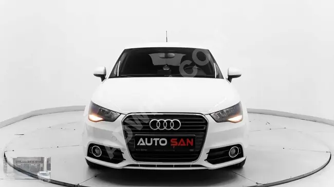 AUDI A1 1.6 TDI Attraction S-Tronic car model 2013 - with unparalleled cleanliness.