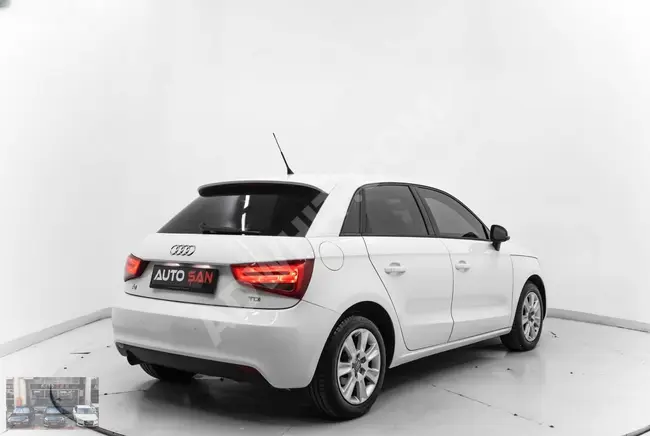 AUDI A1 1.6 TDI Attraction S-Tronic car model 2013 - with unparalleled cleanliness.