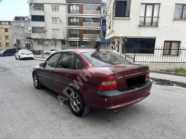 سيارة Opel Vectra 1.6 GL موديل 1997 - بنزين وغاز البترول المسال - محرك مزود بتكييف بلا عيوب