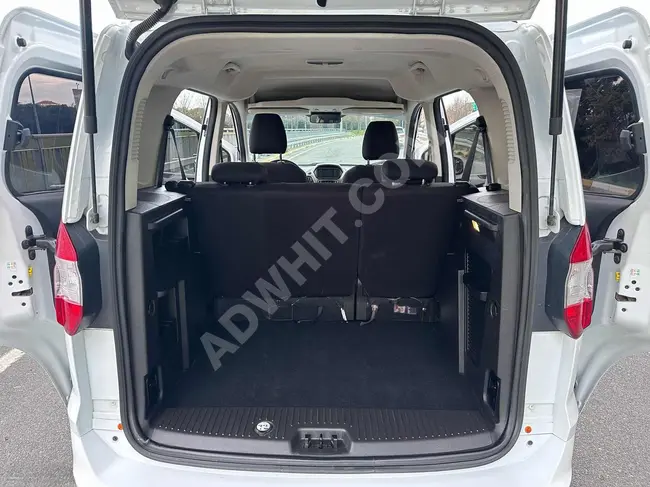 2021 MINI VAN COURIER TITANIUM with a Deluxe Screen at an interest rate of 1.79%.