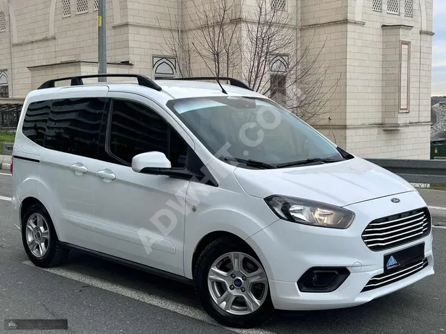 2021 MINI VAN COURIER TITANIUM with a Deluxe Screen at an interest rate of 1.79%.