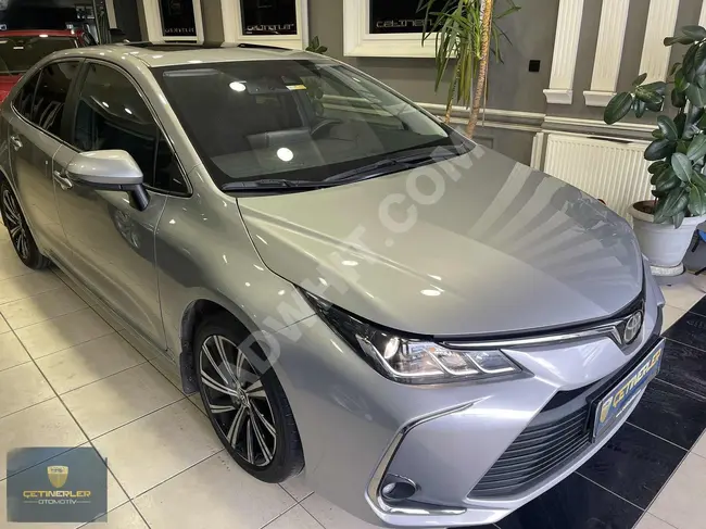 COROLLA 1.5 FLAME X PACK car with a mileage of 22,000 kilometers