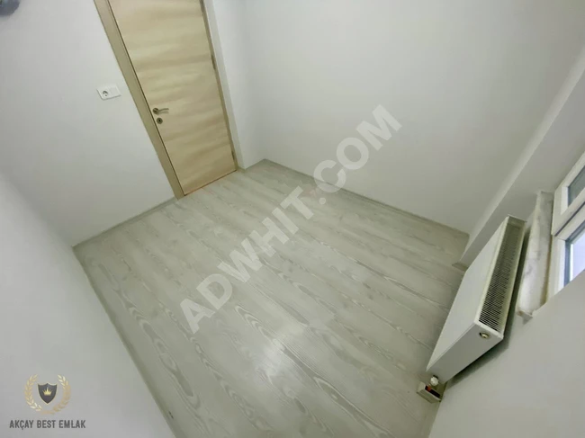 A fully furnished 3+1 apartment in the center of AKÇAY