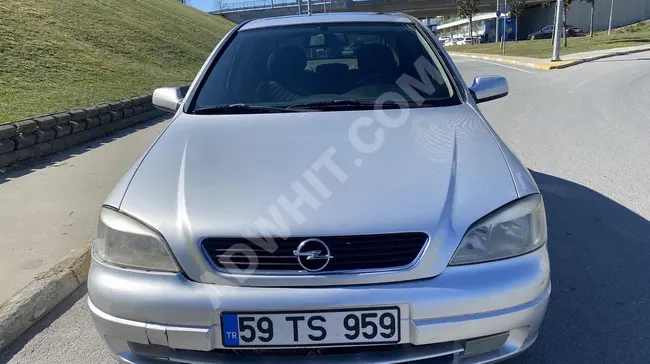 سيارة OPEL ASTRA موديل 2001 - أوتوماتيكية مع سقف شمسي تعمل بالغاز الطبيعي المسال