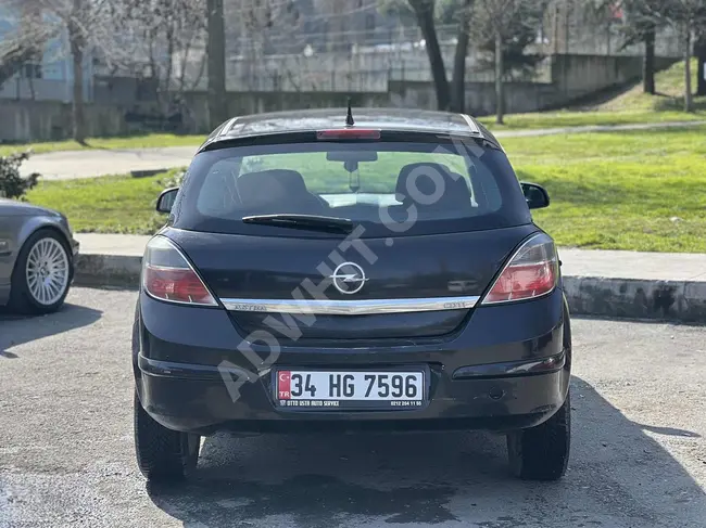 Opel Astra 1.3 CDTI 2011 model with 95 horsepower and cruise control.