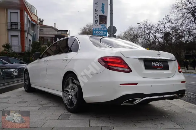 سيارة M-BENZ E 180 AMG 9G-TRONİC موديل 2018 - تسخين المقاعد - ذاكرة