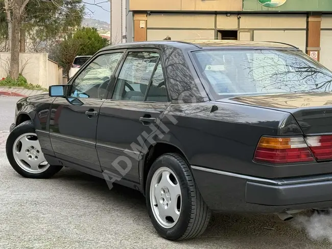 سيارة Mercedes - Benz 260 E بحالة ممتازة - بقوة 160 حصان تكييف سقف شمسي