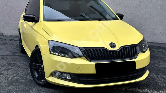 سيارة SKODA FABİA 1.2 TSİ STYLE SPORT DSG موديل 2015 - لون مزدوج