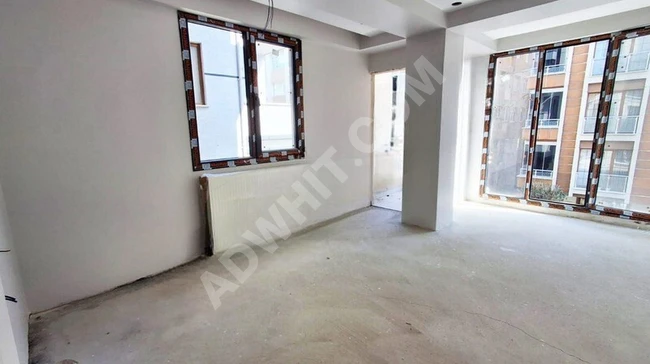 2 + 1 apartment on the first floor for sale on the main street in CENNET district