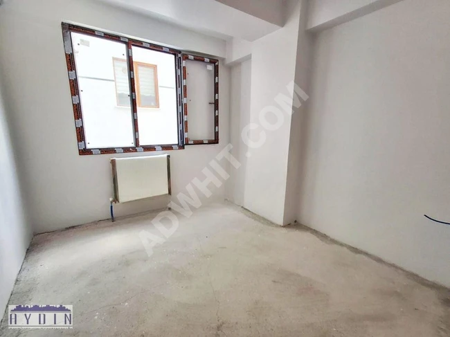 2 + 1 apartment on the first floor for sale on the main street in CENNET district