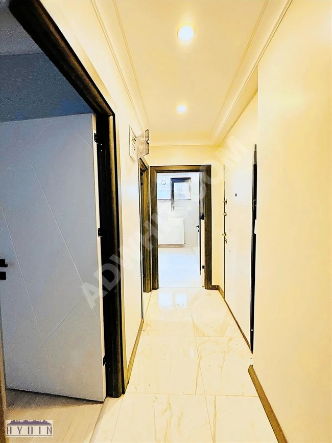 New 2+1 apartment for sale in the second building, 70 square meters, on SULTANMURAT Street.