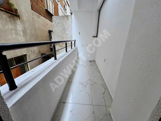 2+1 apartment on a raised ground floor in the İnönü neighborhood.