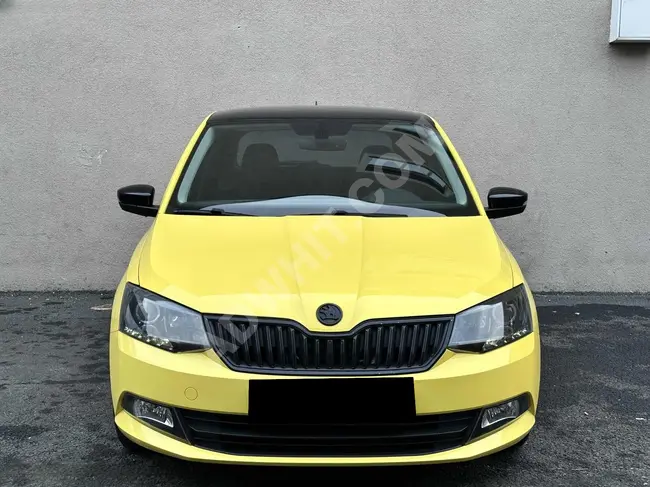 سيارة SKODA FABİA 1.2 TSİ STYLE SPORT DSG موديل 2015 - لون مزدوج