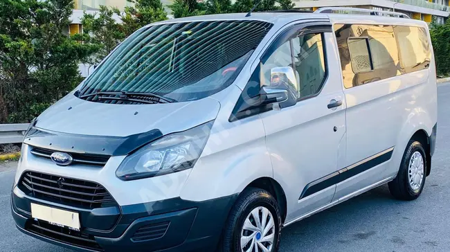 FORD TOURNEO CUSTOM 8+1 van model 2014 - Minibus with R seats and 125 horsepower