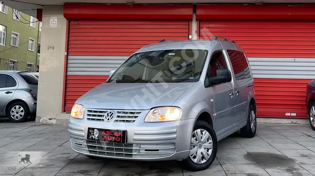 Volkswagen Caddy, model 2010, a car with no additional expenses, suitable for all budgets.