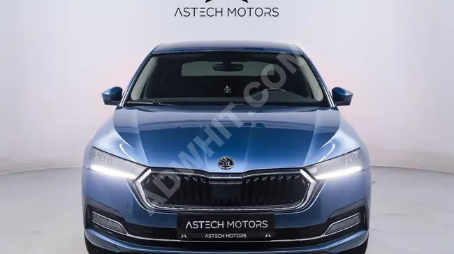 SKODA OCTAVIA 1.5TSI E-TEC car, 2021 model, with 87,000 km and agency maintenance.