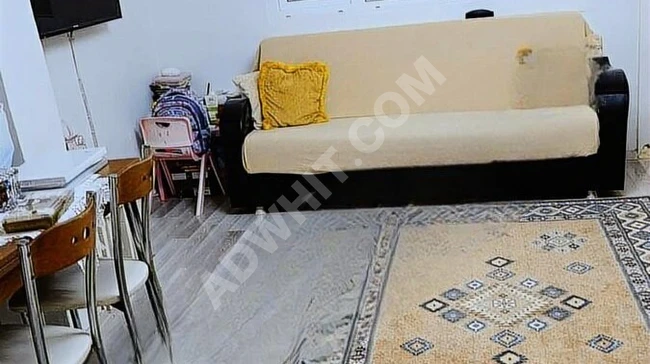 UZUNOĞLU EMLAK TAN MERKEZ MAH.B.KATI 1+1 HİSSELİ SATILIK DAİRE