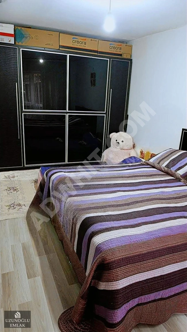 UZUNOĞLU EMLAK TAN MERKEZ MAH.B.KATI 1+1 HİSSELİ SATILIK DAİRE