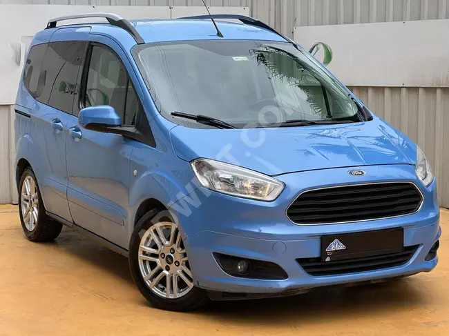 Mini van with a 300,000 down payment, and the rest over 36 months by checks and credit.