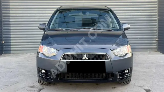 سيارة Mitsubishi Colt ب200.000TL مقدم - بدون طلاء - من المالك الأول - بمسافة 80.000 كم - كالجديدة تماماً