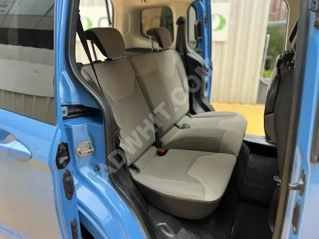 Mini van with a 300,000 down payment, and the rest over 36 months by checks and credit.