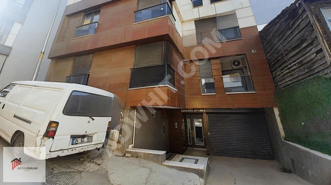 Luxury 2+1 apartment in the city center with parking and elevator.