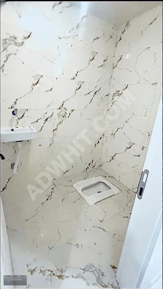 TAŞTAN EMLAKTAN 2+1 sıfır OTOPARKLI SATILIK DAİRE